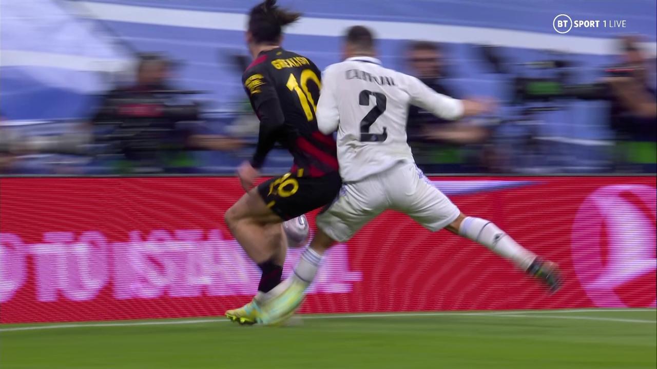 Jack Grealish was sent crashing into the pitchside hoardings by Dani Carvajal