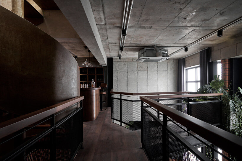 le house renovates penthouse in vietnam with brick, concrete + industrial aesthetics