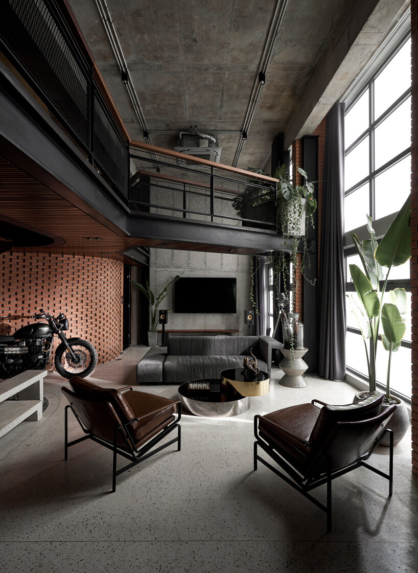 le house renovates penthouse in vietnam with brick, concrete + industrial aesthetics